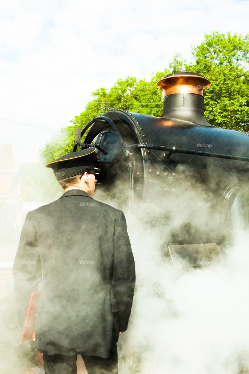 Train conductor and steam train