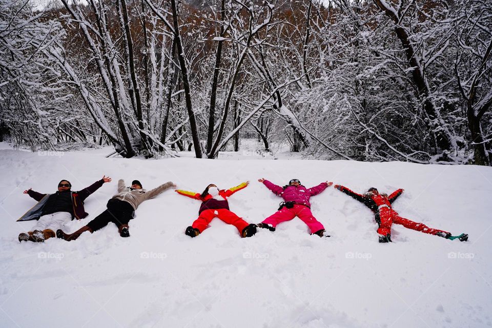 Snow and trees ,ladies in arrow town