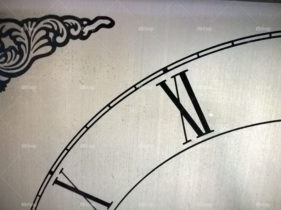 Close-up of grandfather clock.