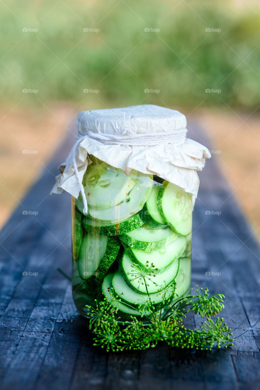 Pickled cucumbers. Pickled cucumbers made with home garden vegetables and herbs