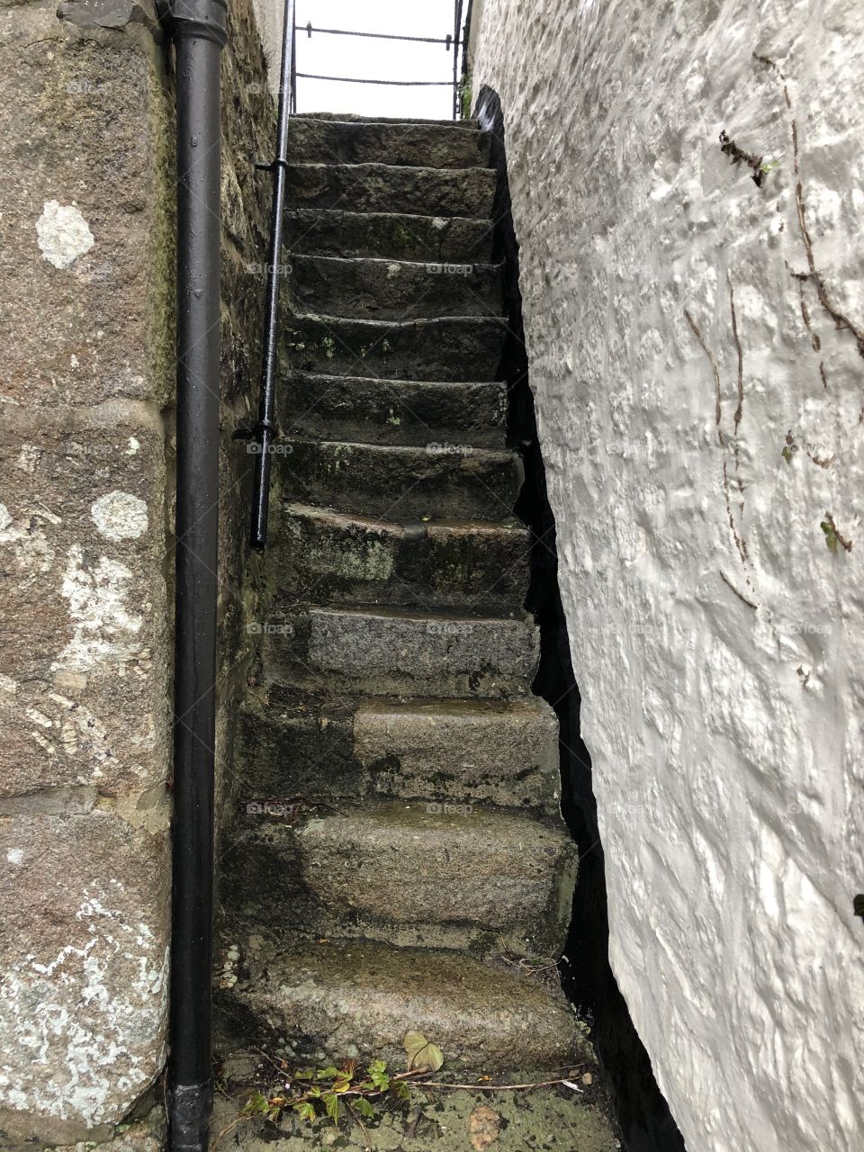 Some side steps to the entrance of St Michaels Church, Ilslington on Dartmoor, Devon, UK. (In Colour)