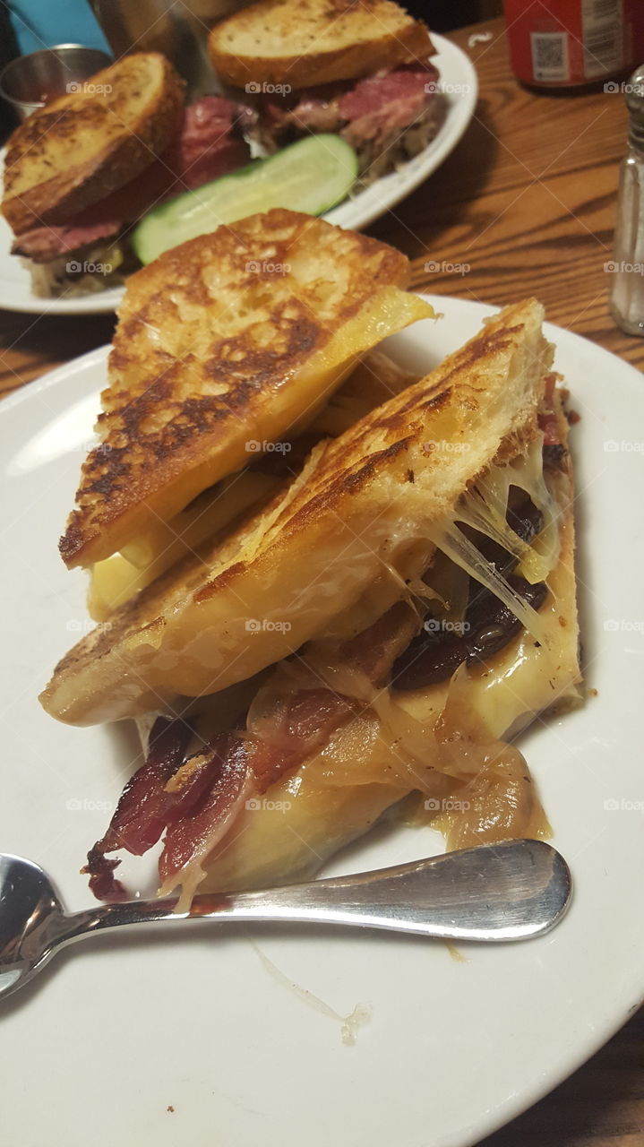 A grilled cheese sandwich with bacon and grilled onions from Friedmans in New York City