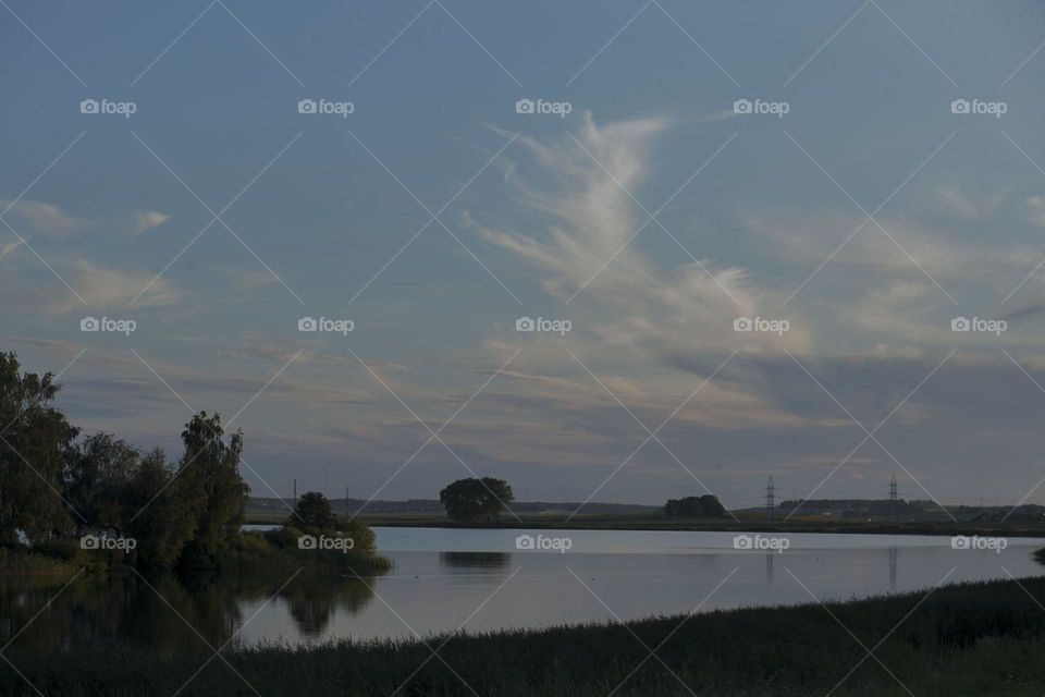 Summer, evening landscape, blue sky.