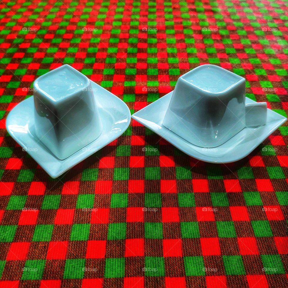 white cups with saucers. A very different model of cups.  Beautiful.