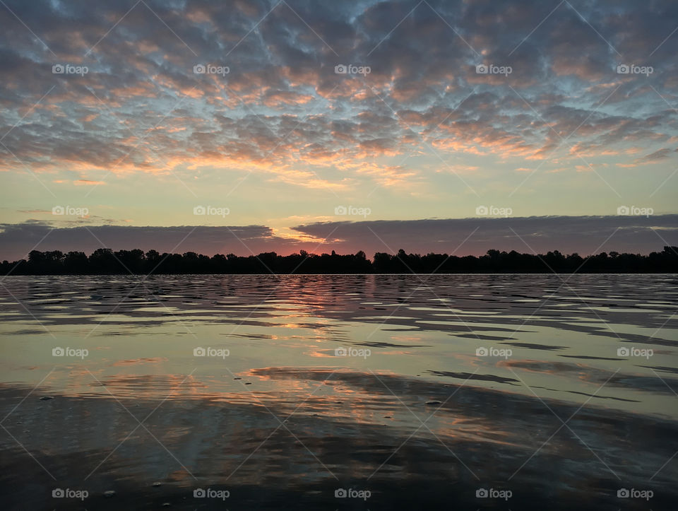 Scenic view of lake during sunrise