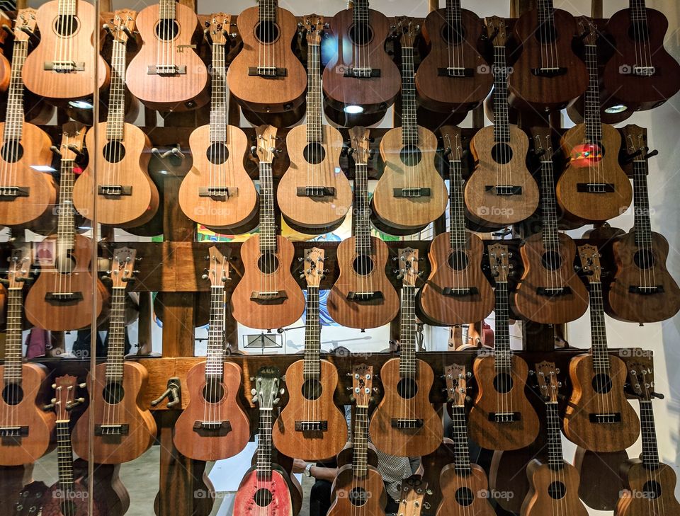 Musical instruments on display at a shop.