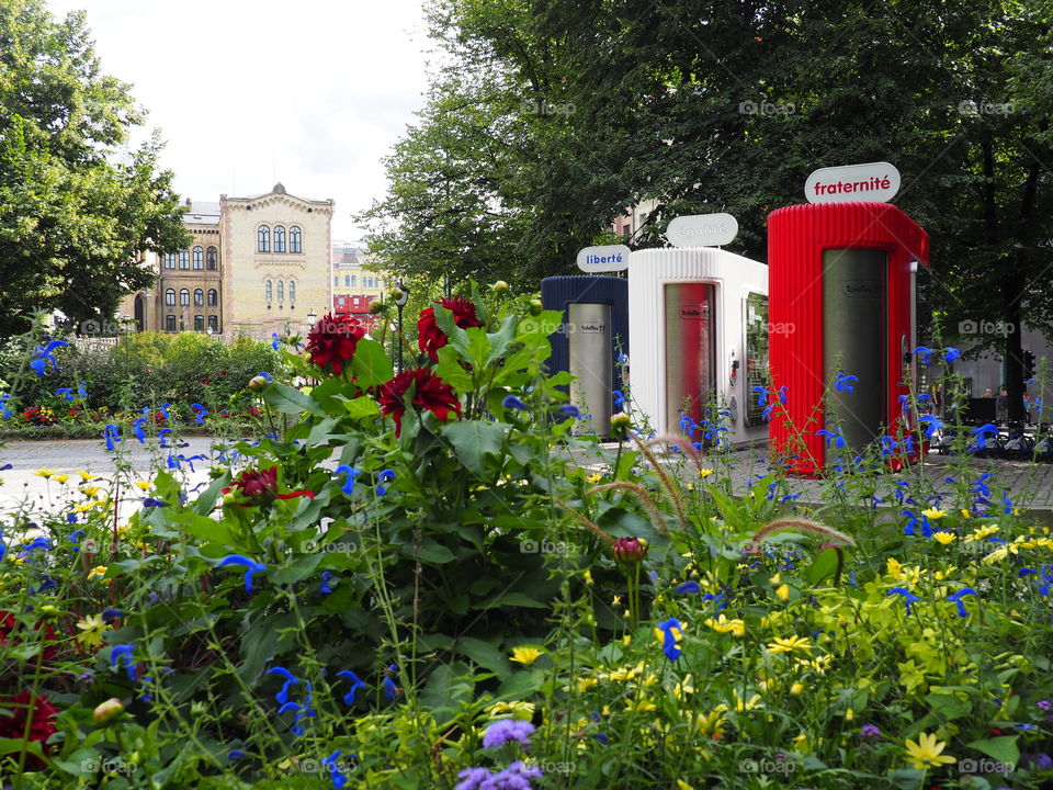 French automatic cleaning toilets with the motto liberté, égalité, fraternité written on top in park in Oslo, Norway