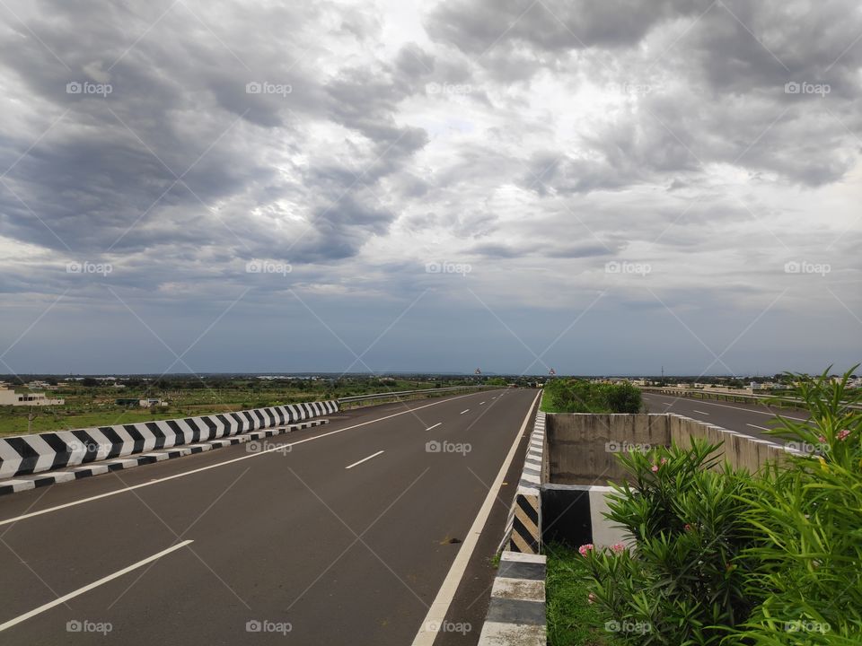 a image of clear highways cloudy sky