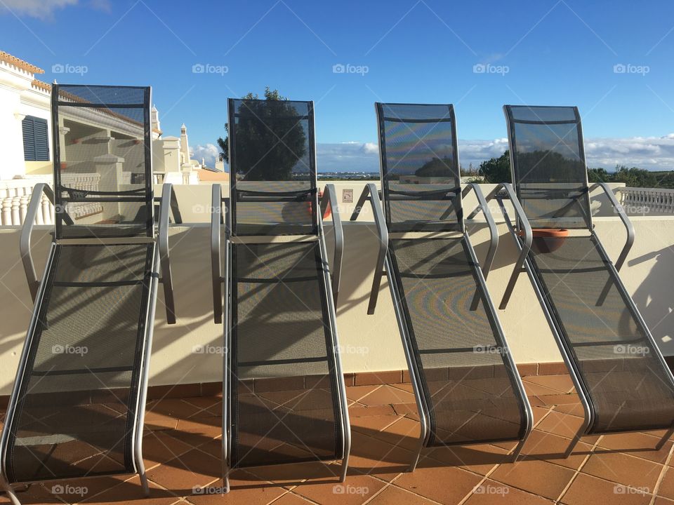 4 deck chairs in pause 