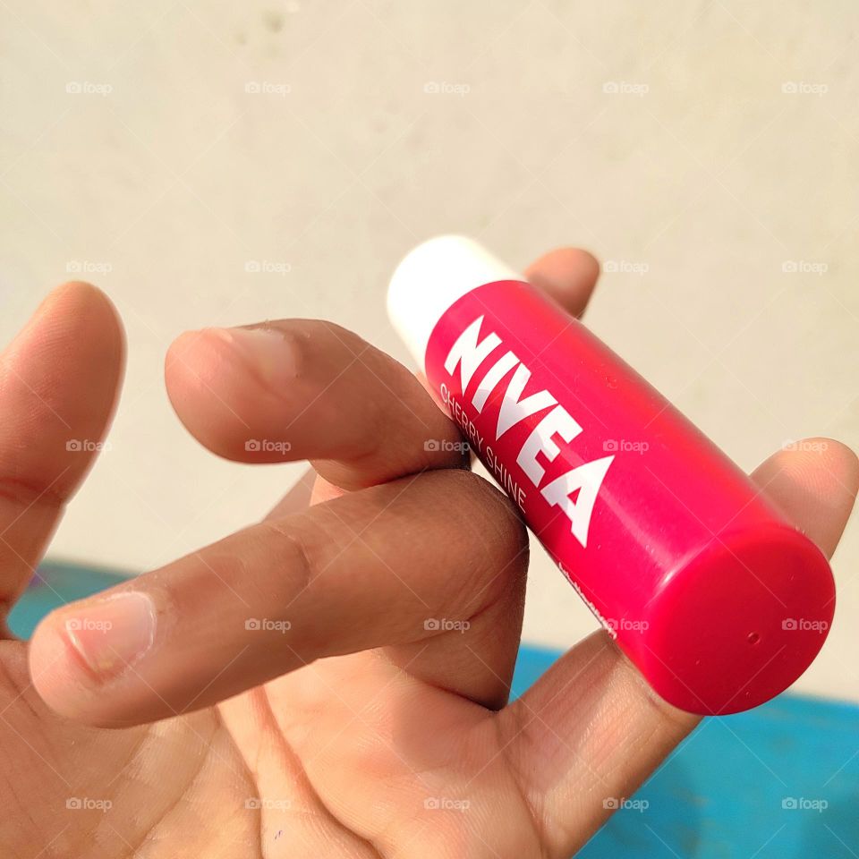 winter essential lip care in hand