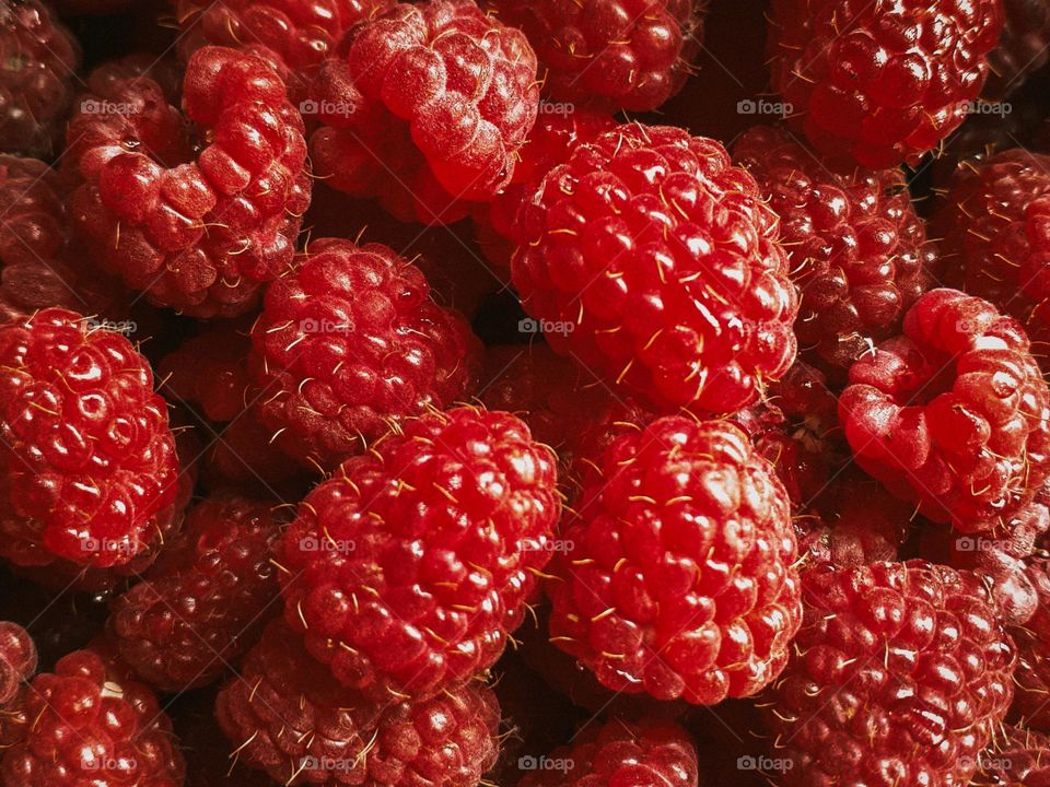 The season of berries, namely pink raspberries