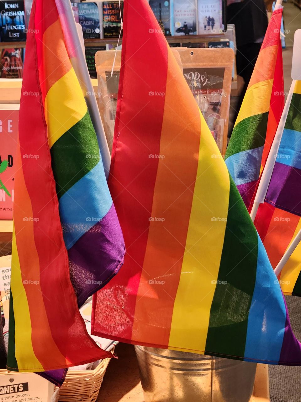 close up of rainbow pride flags for sale in Oregon bookstore