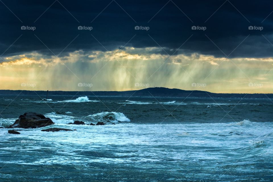 Scenic view of beach in stormy weather