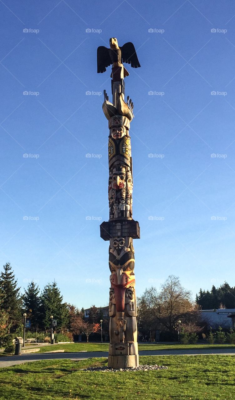 Western totem at UBC in Vancouver, British Columbia on a clear, crisp Autumn day