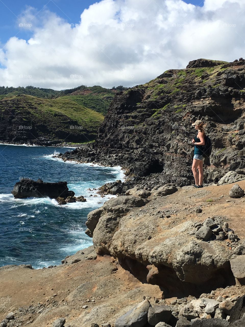 A hike over looking the beautiful ocean along the steep cliffs near the Blow Hole in Maui, Hawaii. 