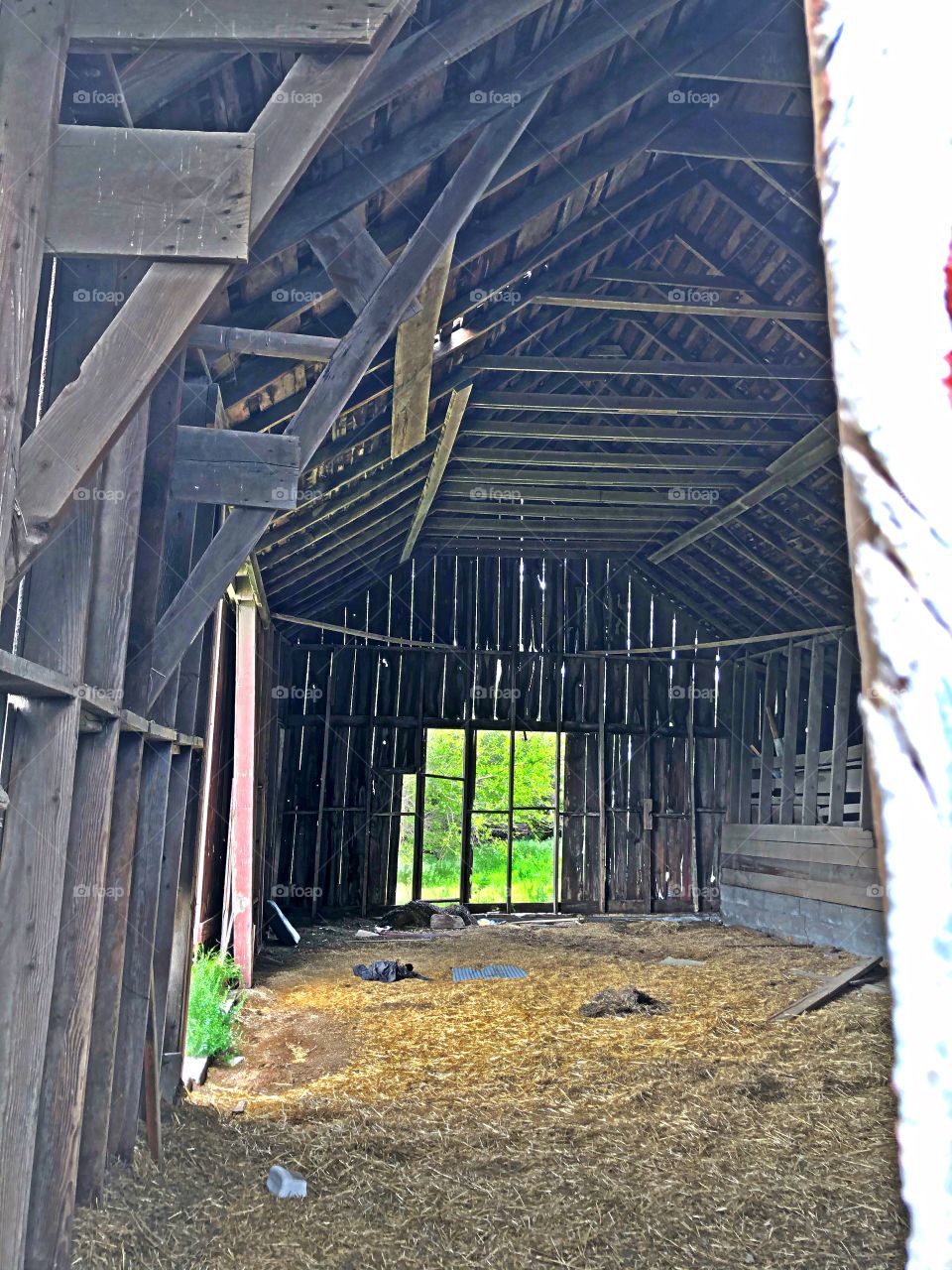 The insides of a lonely old barn