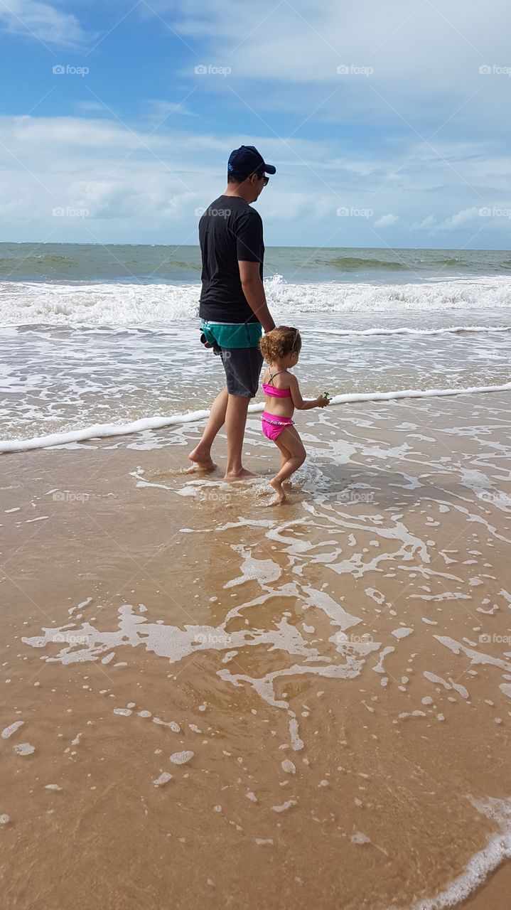 beach daughter and dad