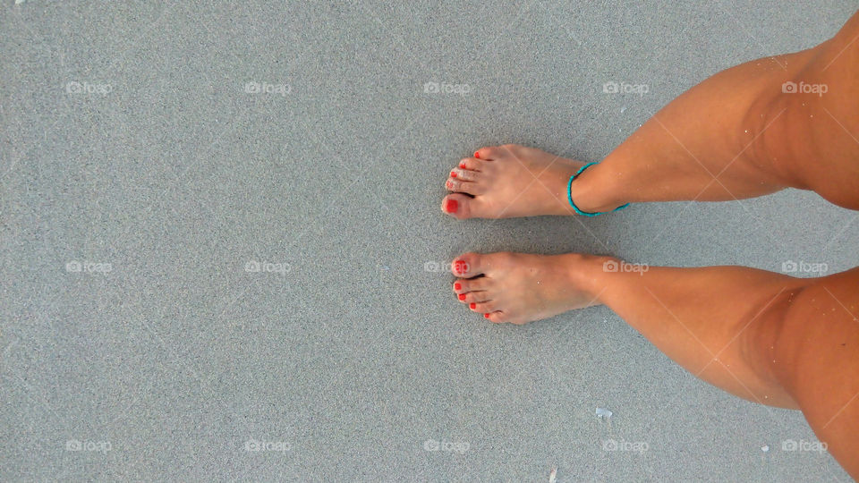 Feet in the sand