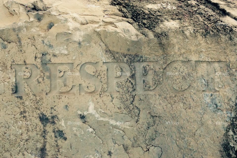 Respect carved in stone. The word RESPECT carved in stone