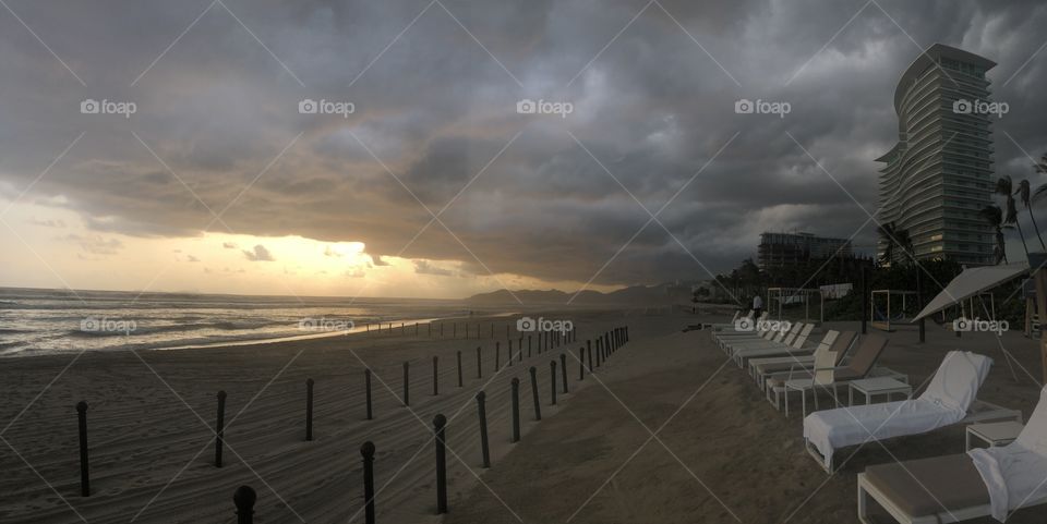 This is a picture I took in a really cloudy day in Acapulco Mexico, it looks nice because you can still see the sun even tho there are a bunch of clouds over it