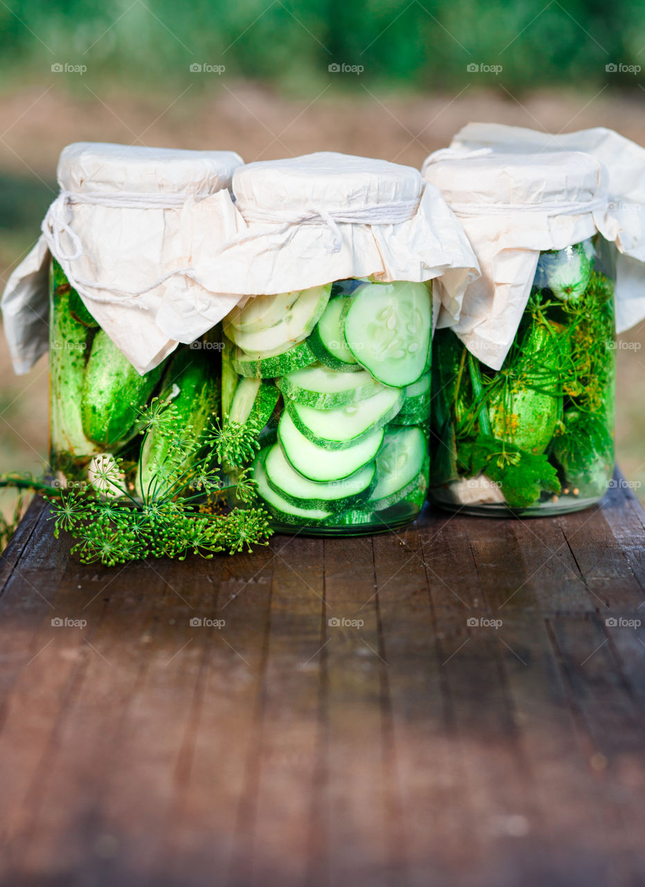 Pickled cucumbers. Pickled cucumbers made with home garden vegetables and herbs