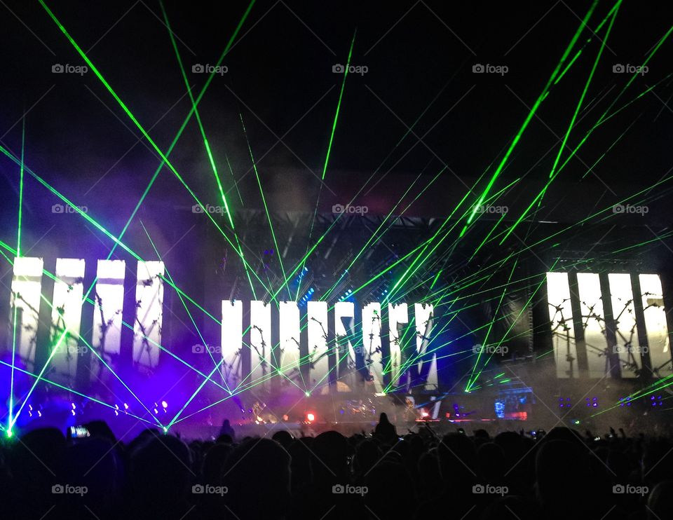 This shot is from a Metallica concert in Denmark. Lots of people, loud music and lasers.