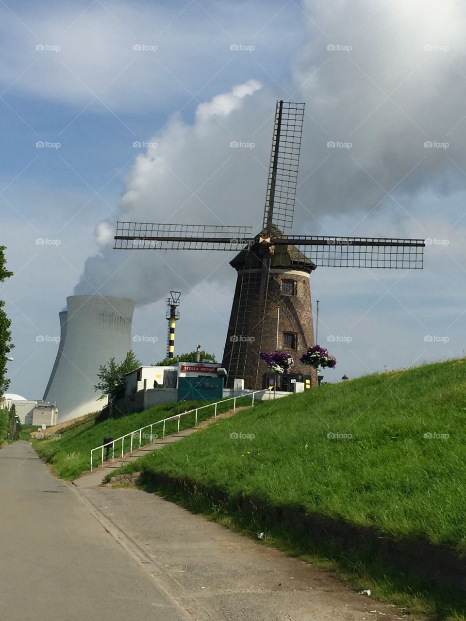Mill in front of a nuclear reactor. Belgium Doel