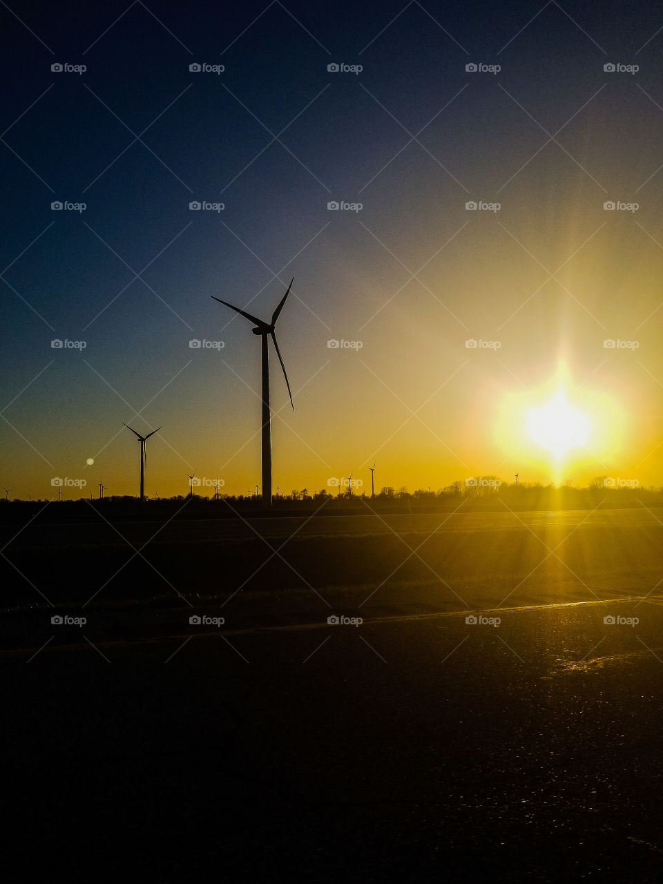 sunset and windmills