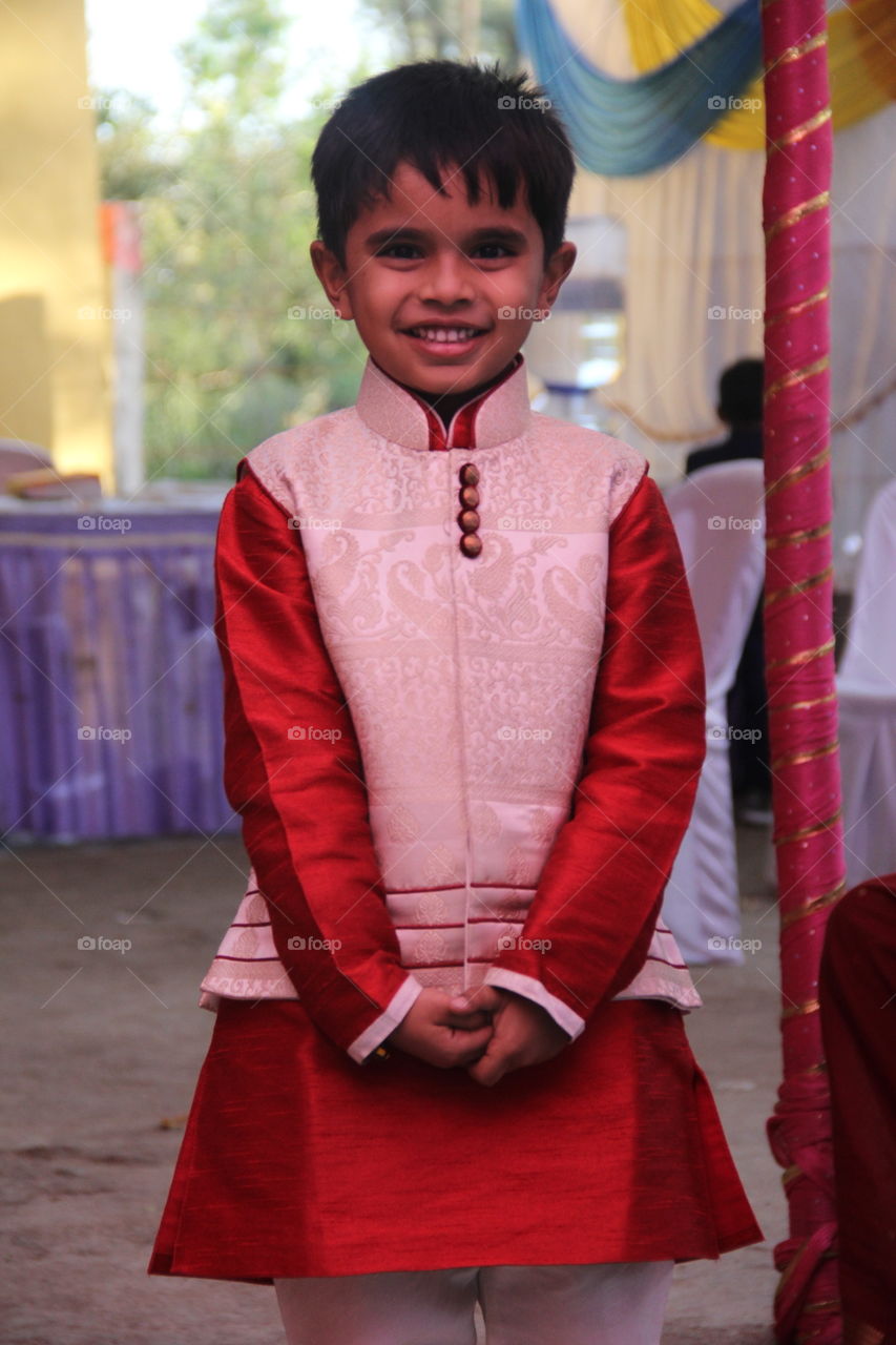 Portrait of a cute boy in traditional clothing