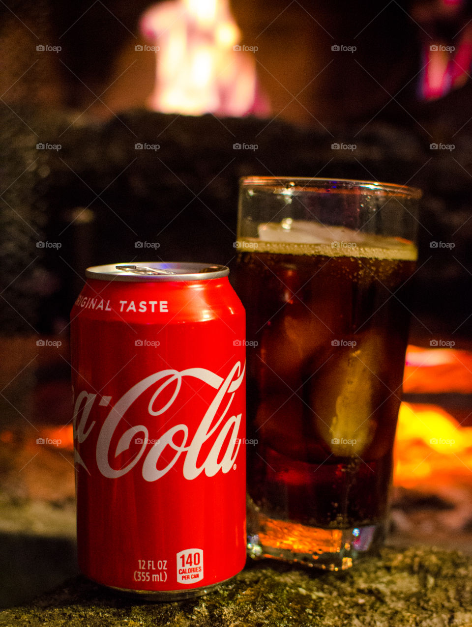 Enjoy a nice Coca-Cola in front of a warm fire