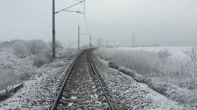 Empty railway track during winter