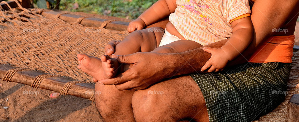 child holds  parents hand