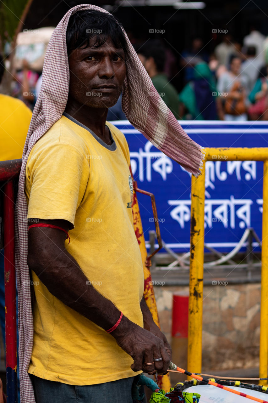 Dhakis (Bengali: ঢাকি) are traditional drummers who play the dhak (drum) during Hindu festivals, primarily in Bengal. Drum beats are an integral part of the five-day-long annual festivities associated with Durga Puja.