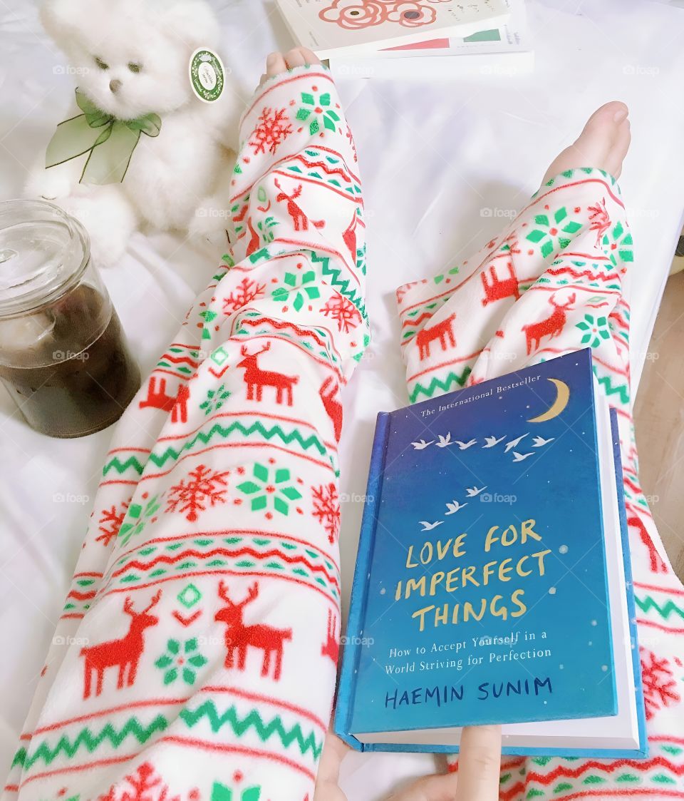 wearing cute pajamas and read a novel before going to bed