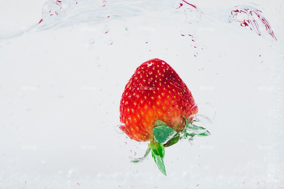 Fresh strawberry in the water 