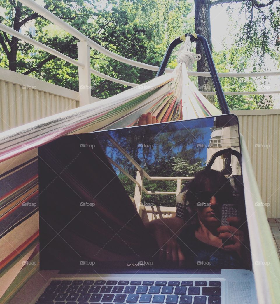 Working from the hammock at the balcony