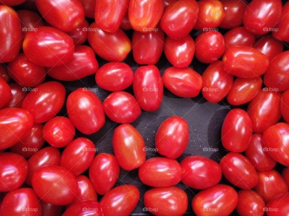 red tomatoes background