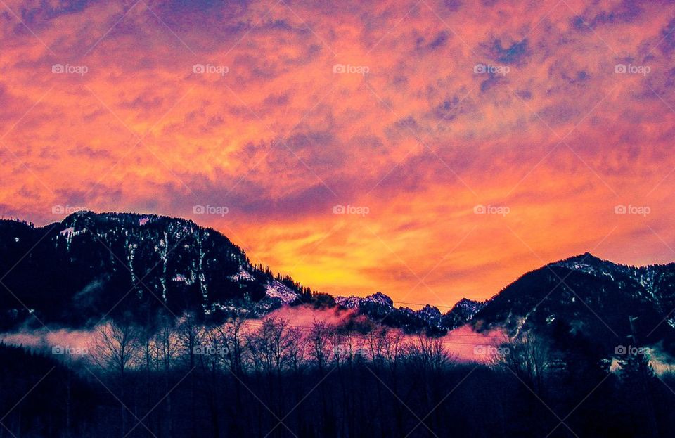 Scenic view of mountain at sunset