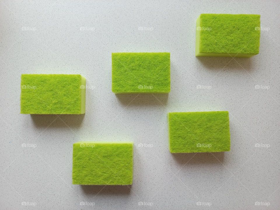 green rectangular sponges.