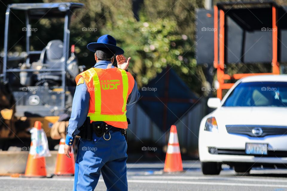 Traffic police officer on duty in the road