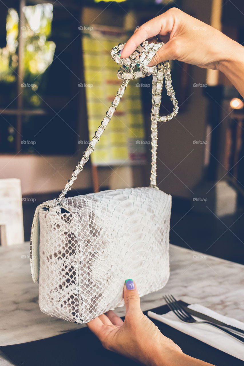 White python bag on the table