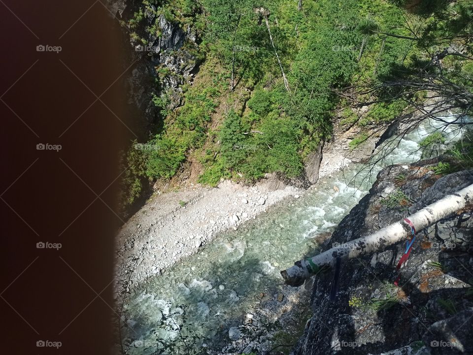 Rough river and my finger