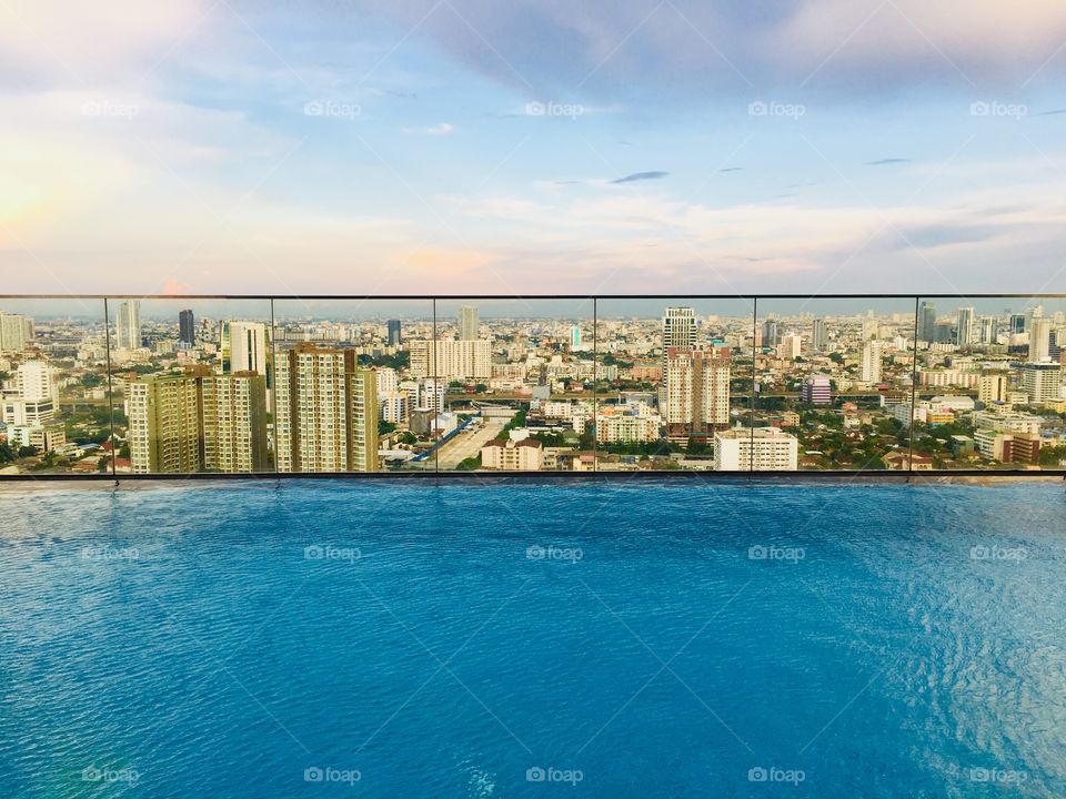 Swimming pool roof top with city view in bangkok