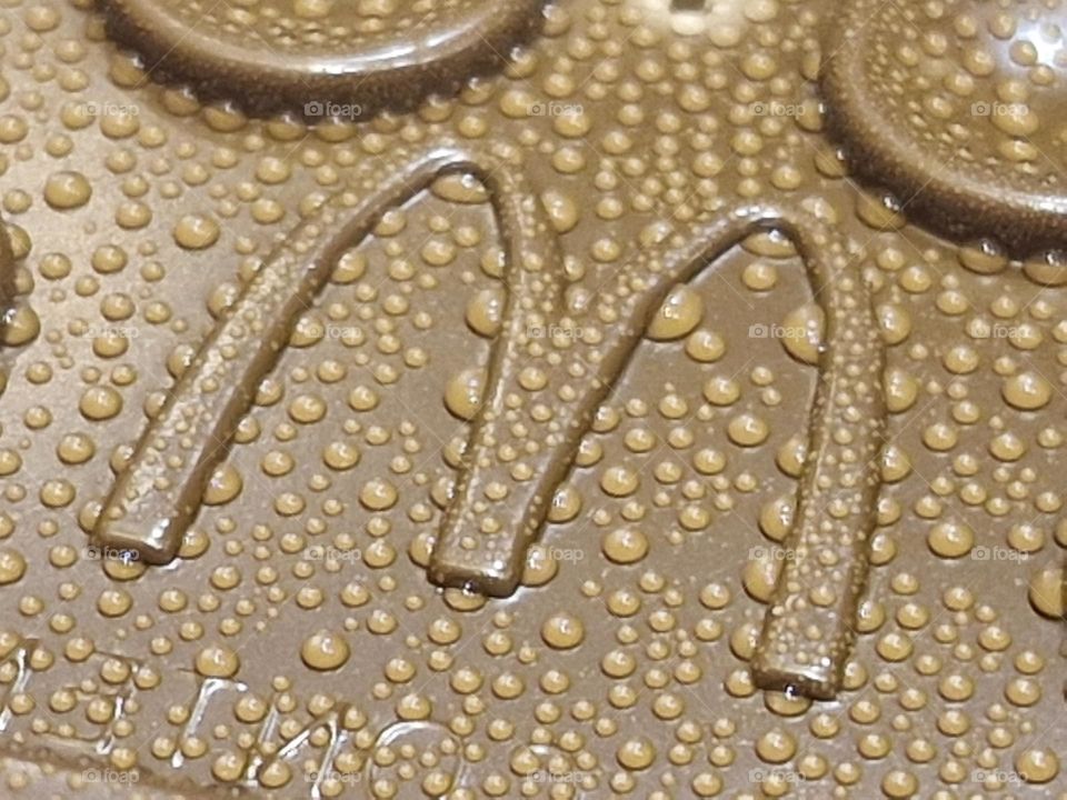 mcd's coffee cup cap with water drops