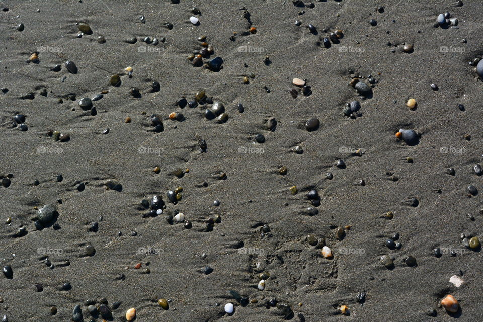 Small rock texture on sand 