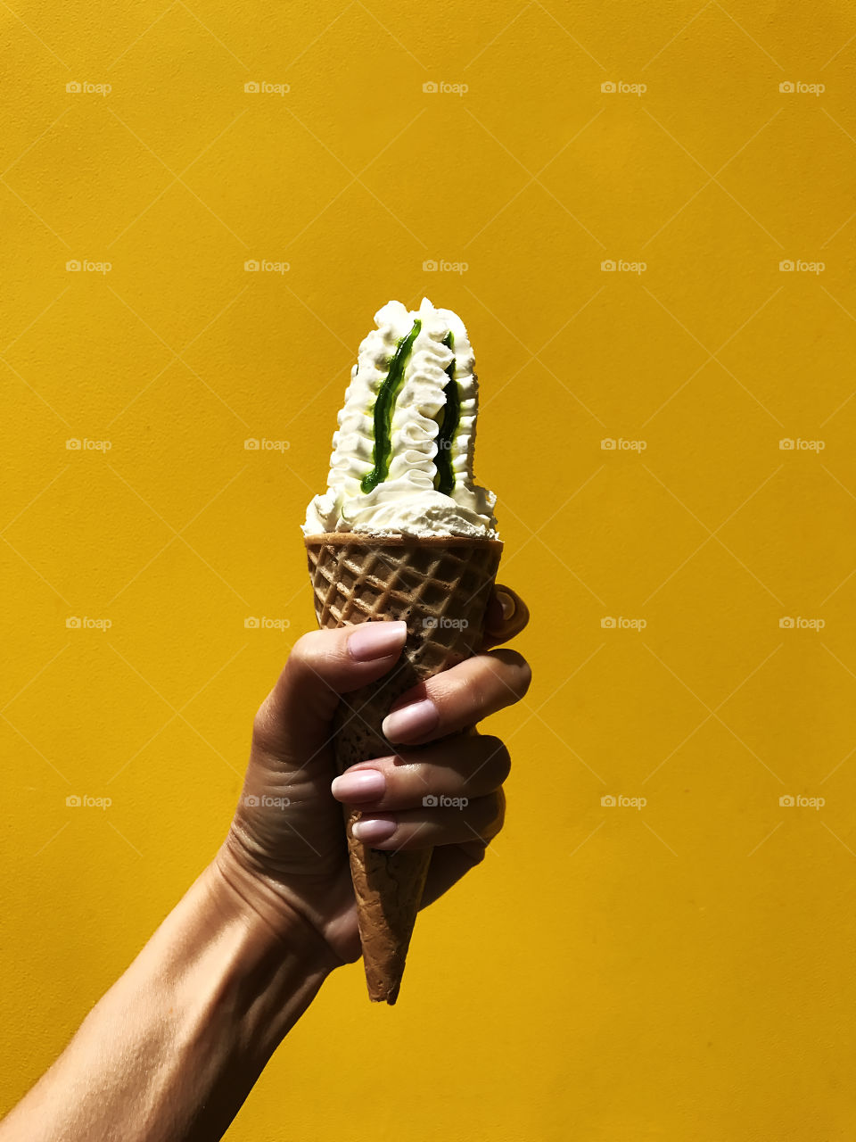 Ice cream on yellow background 