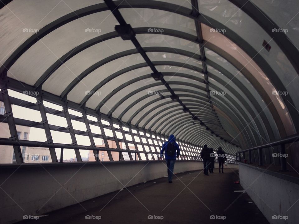 Tunnel for pedestrians made of glass and metal in Moscow, Russia