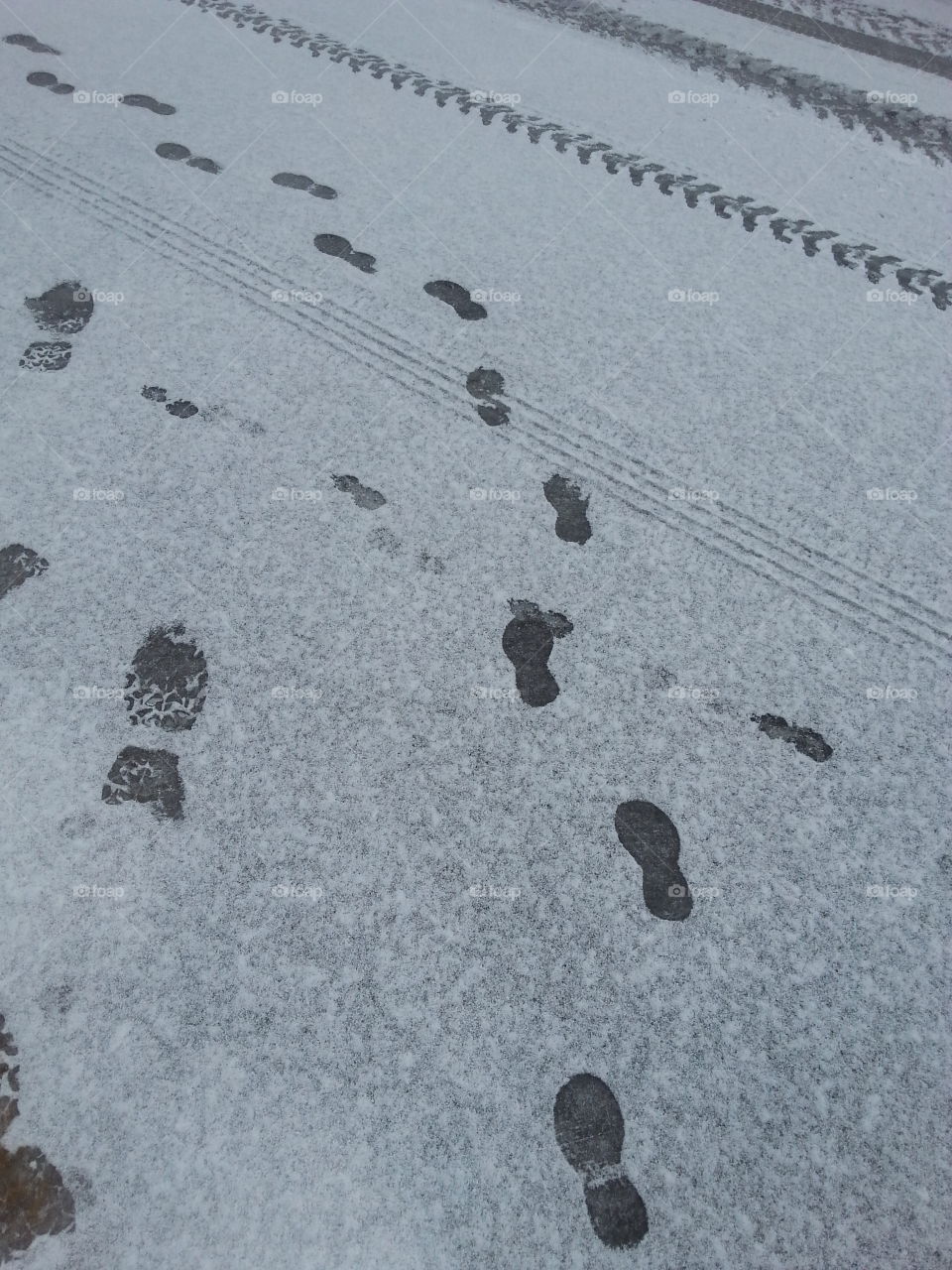 feet prints in the snow