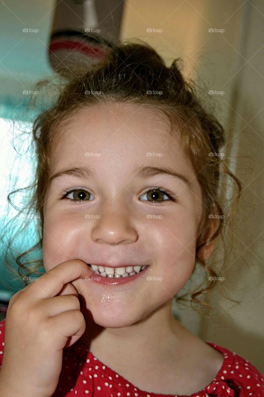Portrait of a cute happy girl