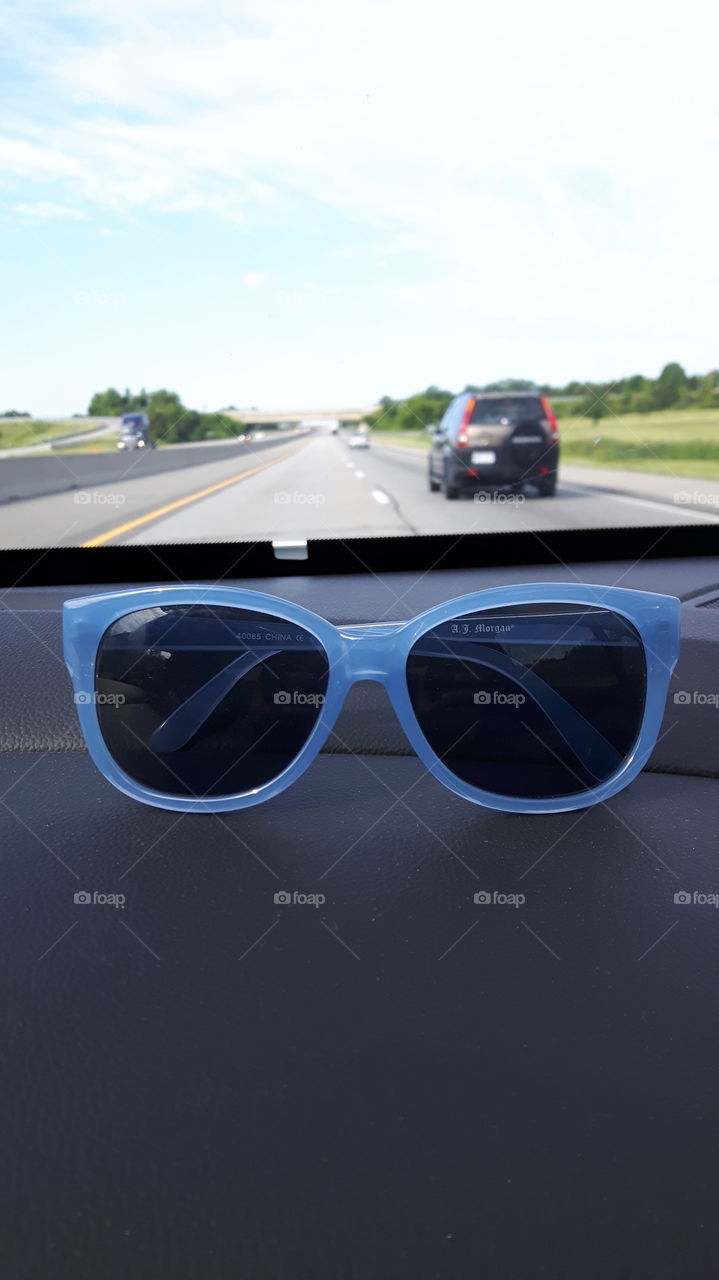 sunglasses on a road trip 401